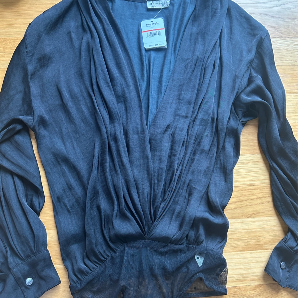 Free people body suit. Silky black and new with tags.